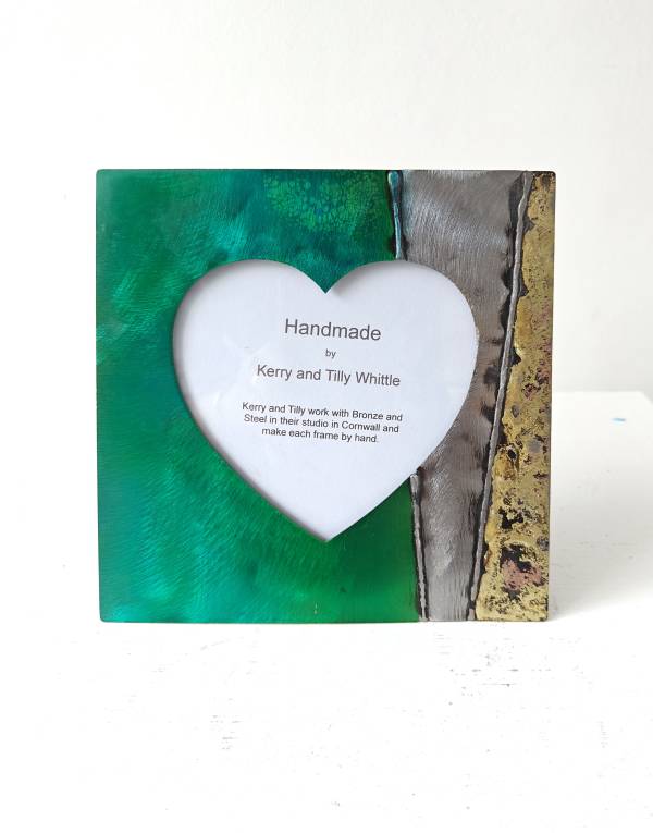 - a , metal Sculpture by Whittle Design, measuring 13 x 13 cm (H x W) framed at 19 x 19 cm £39